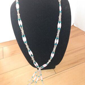 Double strand necklace with pink, blue, and silver beads.